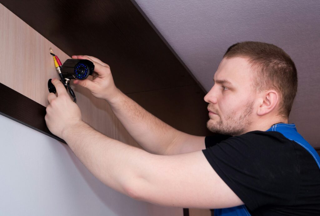 Professional security camera installation by Everly Secure technician